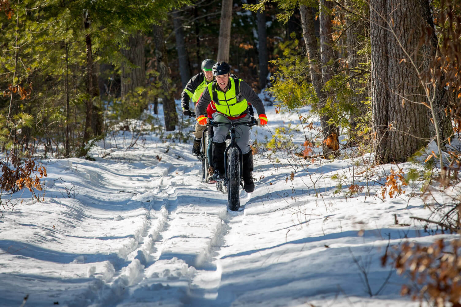 People riding Fatbikes near The Inn at Oxbow Acres in Milan, NH
